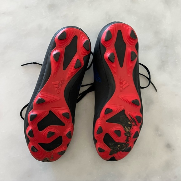 Adidas Unisex -Child X Speedflow. 4 Flexible Ground Soccer Cleat. Black, blue. 4 - Picture 7 of 8